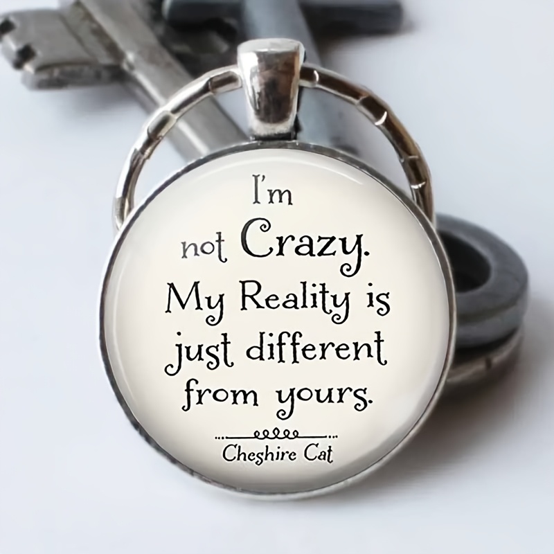 

1pc Cheshire Cat Quote Round Alloy Keychain, " Crazy" Letter Glass Pendant, Fashionable Bag Charm, Ideal Christmas Gift For