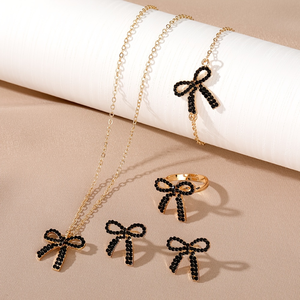 

A Set Of 4 Pieces With Butterfly Bows, Including A Necklace, A Of , A , And A Bracelet. A Unique And -end Jewelry Piece.