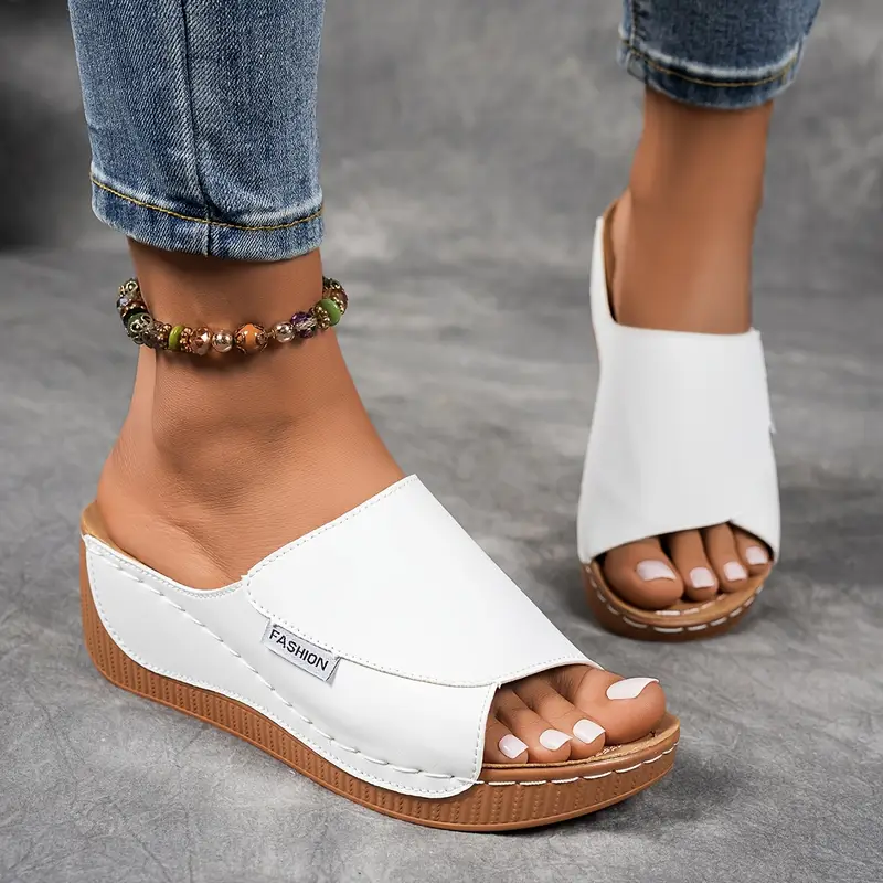 Witte slip-on plateau sandalen