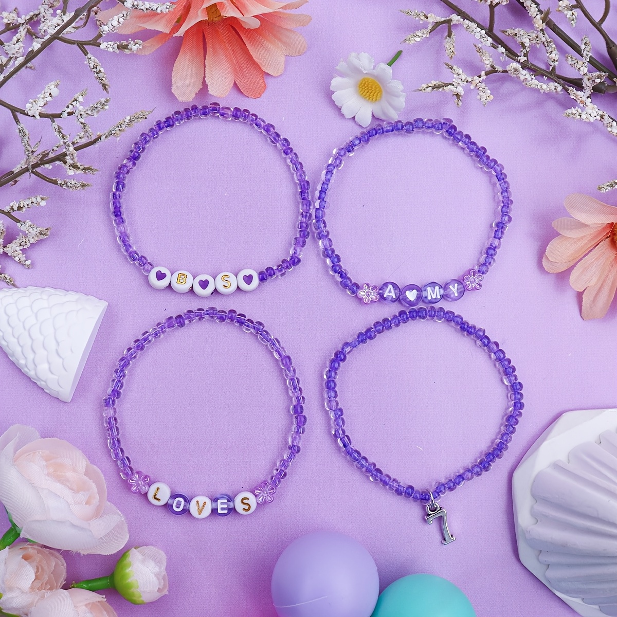 four   bead bracelets with letter charms and a pendant featuring   7 the perfect   accessory for music festivals concerts   and   and     a delicate piece for casual attire