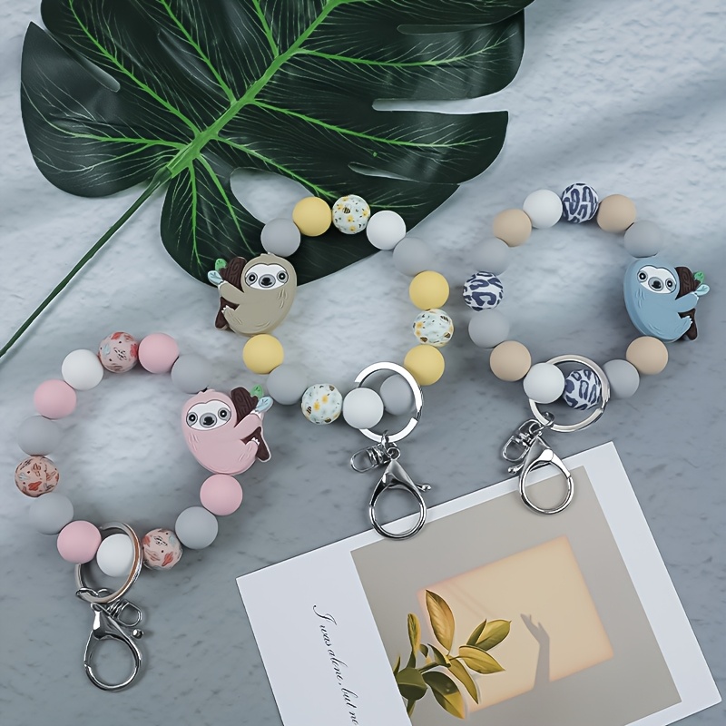TEMU Set Of 3 Adorable Sloth-themed Silicone Bead Bracelets And Keychains, Perfect For Preventing Loss And Decorating Bags; A Great Gift For The