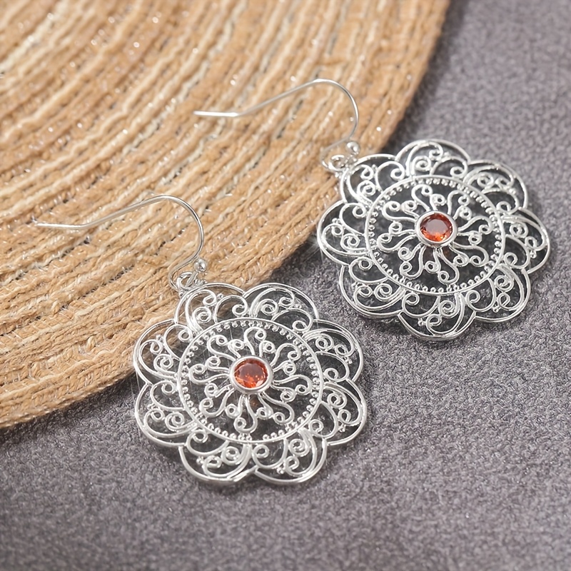 Image of Earrings Feature A Vintage With Floral Pendants And Synthetic Red Gemstones, Making Them Perfect For Women