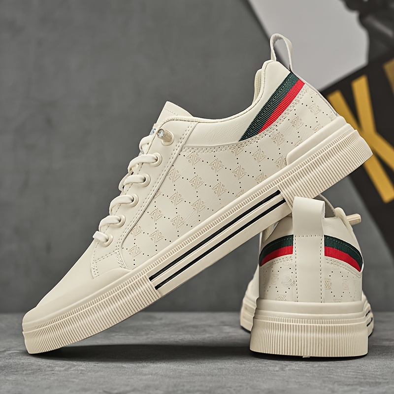 a pair of casual mens sports shoes for spring features a durable pu   lace up low top style with a soft comfortable lining thickened wear resistant pvc sole for   comfortable breathable and lightweight ideal for outdoor
