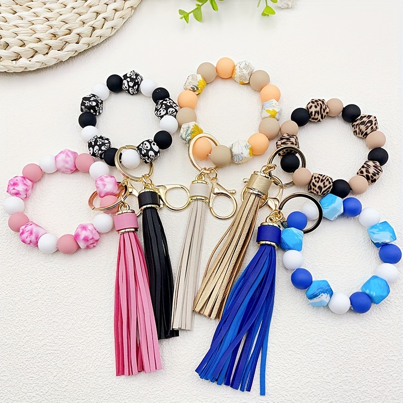 

Silicone Beaded Wristlet Keychain With Pu Leather Tassel Skull Flower Leopard Fashion Bag Charm Phone Lanyard Women Daily Uses Gift