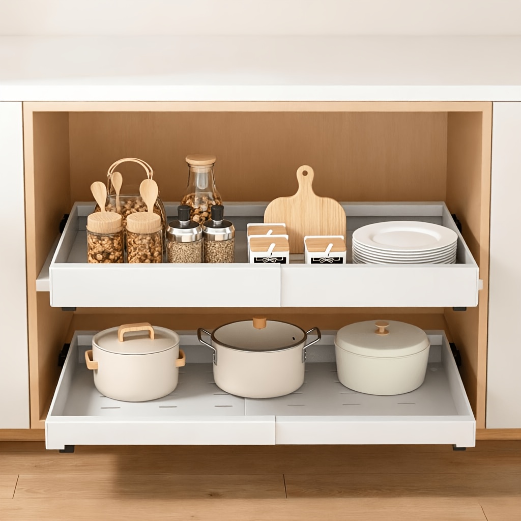 A Kitchen Drawer Organizer That Expanded: This Adjustable-width Cabinet Organizer Features A Sticky Pull-out Design For Organizing Food Storage (dimensions: 32-53 Cm Wide, 43 Cm Deep