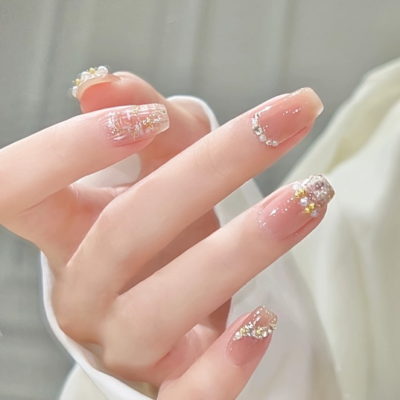 a set of 24 medium length   nails designed with rhinestones fully covering acrylic nails suitable for women and Product details 1