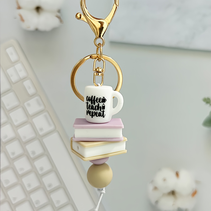 Image of 1 Pebble Silicone Keychain, ", , Cup - Cartoon Animation". Women's Themed Key Ring With Carabiner Decoration Backpack Additions, Teacher's Day Gift, Thanksgiving Theme, Silicone Keychain Pendant