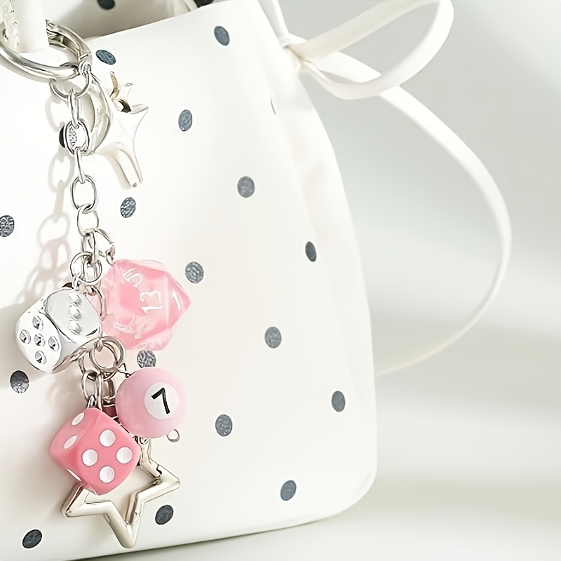 purple keychains sold on Temu United States