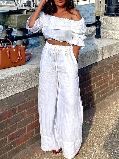 this womens spring and summer fashion set features a solid shoulder top with ruffles and wide leg pants daily commuting casual or vacations