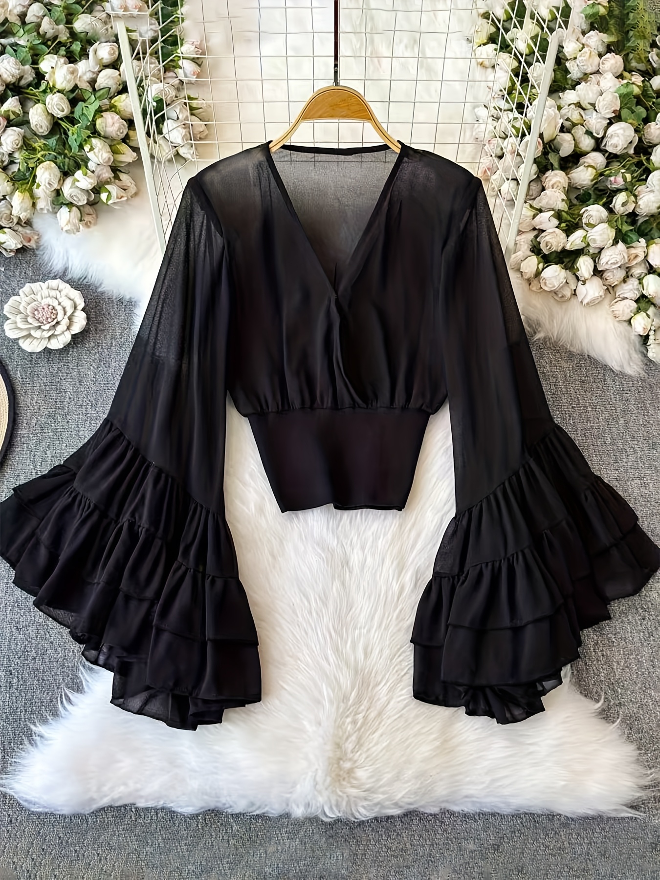 flare sleeve top sold on Temu United States