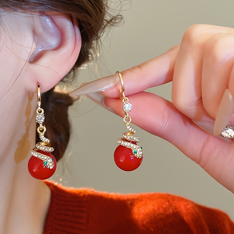 

A Pair Of Elegant Water Snake-shaped Round Ball Earrings For New Year Gifts.