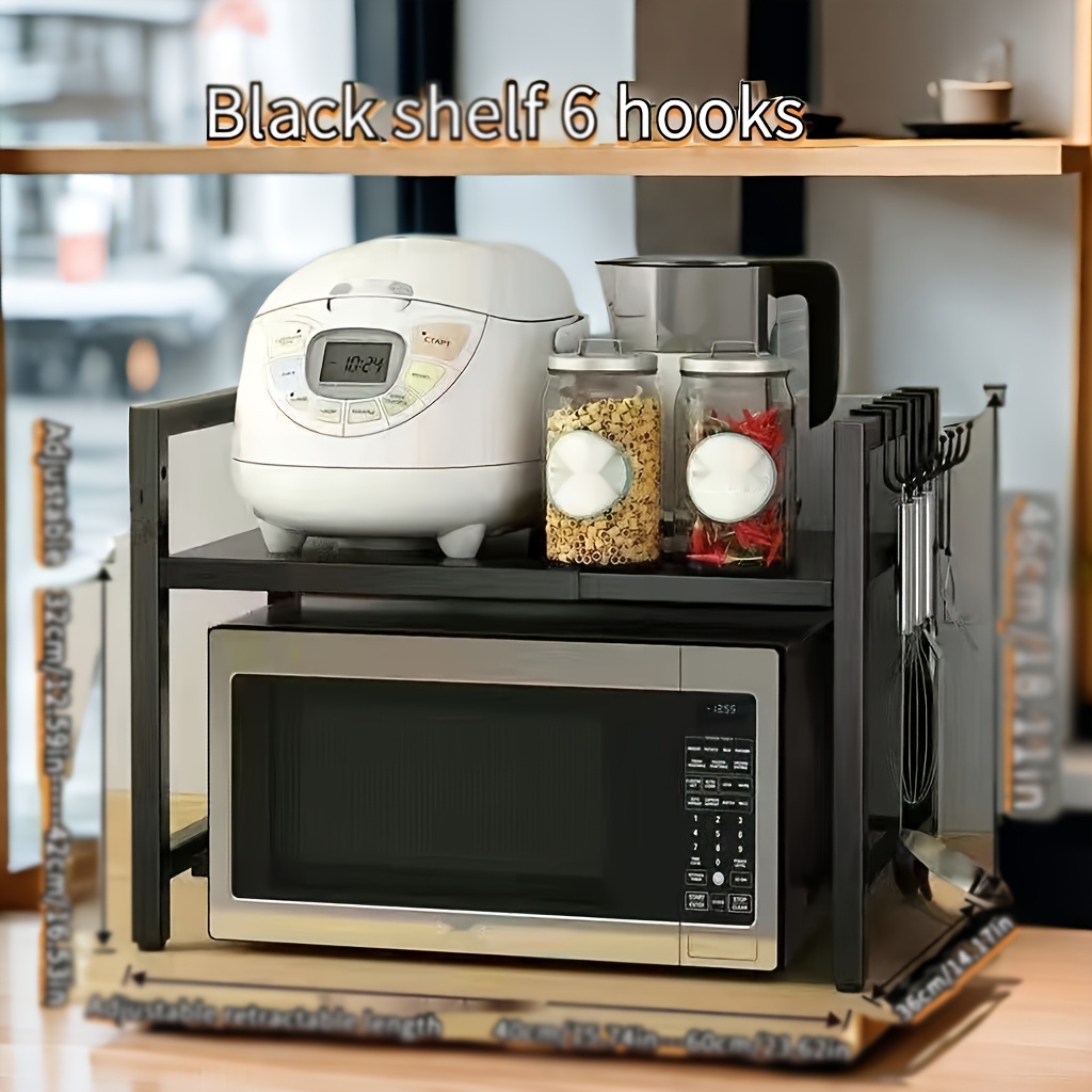 An Expandable Microwave Rack With 2 Layers, A Metal Kitchen Countertop Storage Shelf, Featuring 6 Hooks, Suitable For Microwave Placement, An Efficient Home Kitchen Storage Solution, And Practical