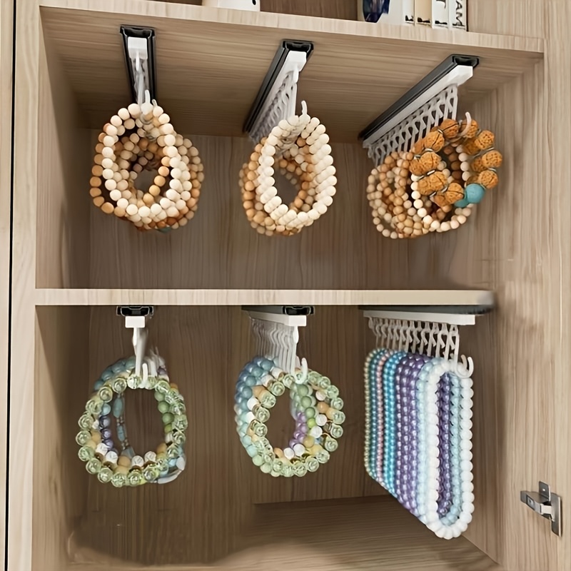 portable jewelry storage rack portable pants hanger portable necklace bracelet earring holder space saving storage solution made of plastic Product details 0