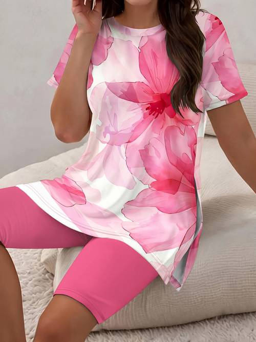 a womens casual tropical floral print short sleeve top and shorts set featuring a stylish short sleeve top with side slits with comfortable fitted shorts a round neck pullover with layered details designed as a two piece casual outfit