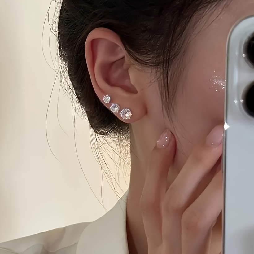 12 pairs of stainless steel stud earrings a simple and elegant cubic earring set the geometric six claw cubic set       for parties and   making it an   accessory for daily commuting