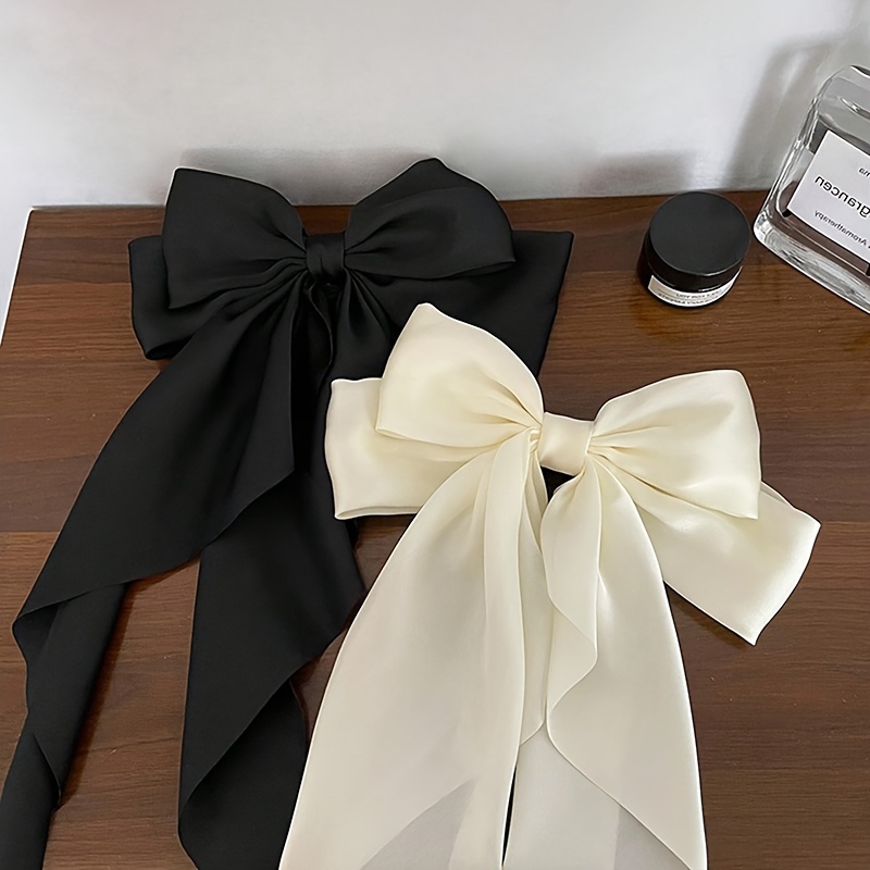 Свадебные букеты, заколки и резинки для волос из атласных лент