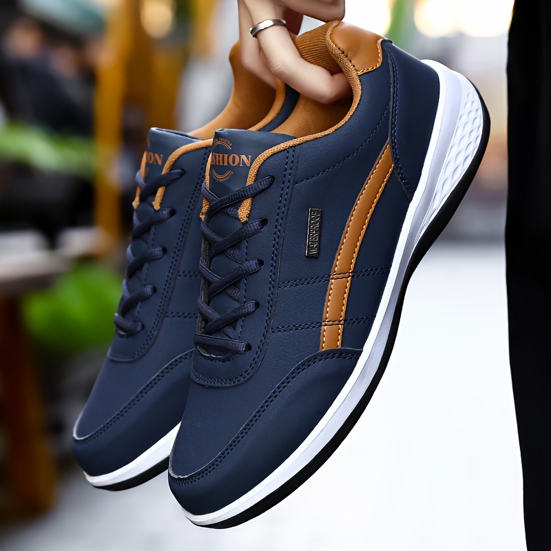 

Baskets Légères et Respirantes - Chaussures de Course Décontractées en Cuir Synthétique avec Sportif, Bleu Marine & Accents Orange, Confort Toutes pour Hommes et Femmes