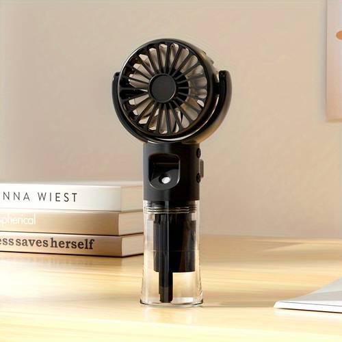 portable handheld misting fan for outdoor use featuring a desktop humidifying function and four adjustable speed settings