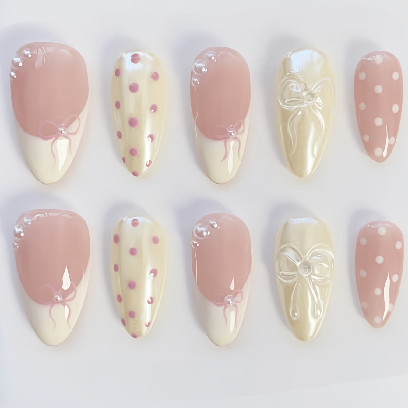 TEMU 10pcs Almond-shaped Press-on Epoxy Acrylic False Nail Set, Nude, Yellow, And White, With Polka Dot And Bow Patterns And Pearl Embellishments.