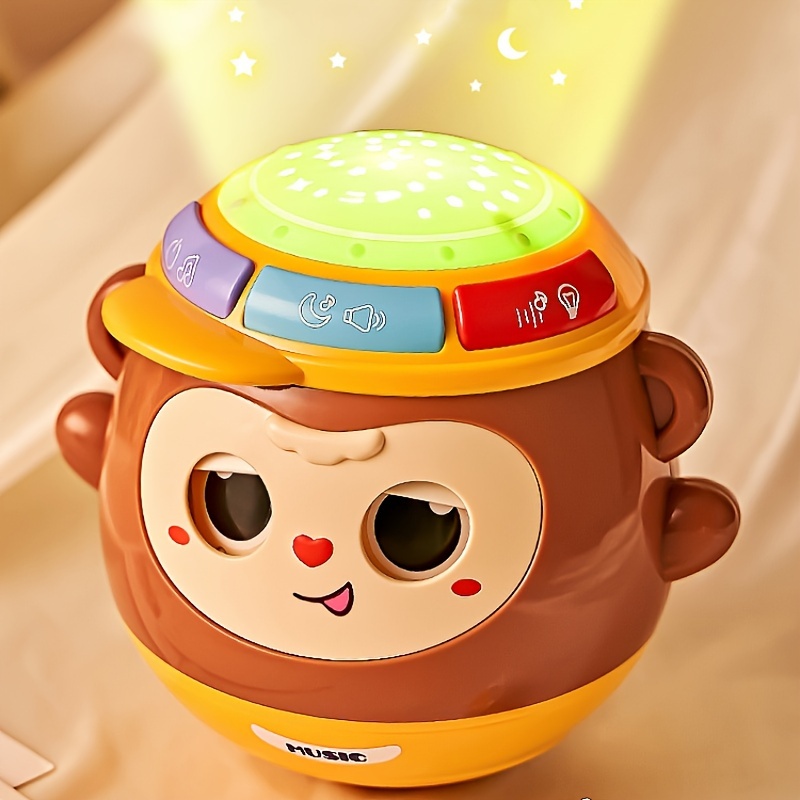 

1pc Monkey Hand Drum Toy That Can Blink, Early Education Multifunctional Rhythm Projection Hand Drum Toy With Light And Music