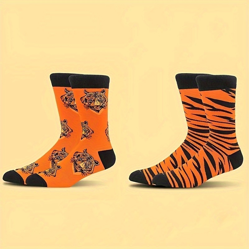 

A Set Of Of Seasonal Socks Featuring A And Tiger Pattern, Suitable For Indoor And Outdoor Use.