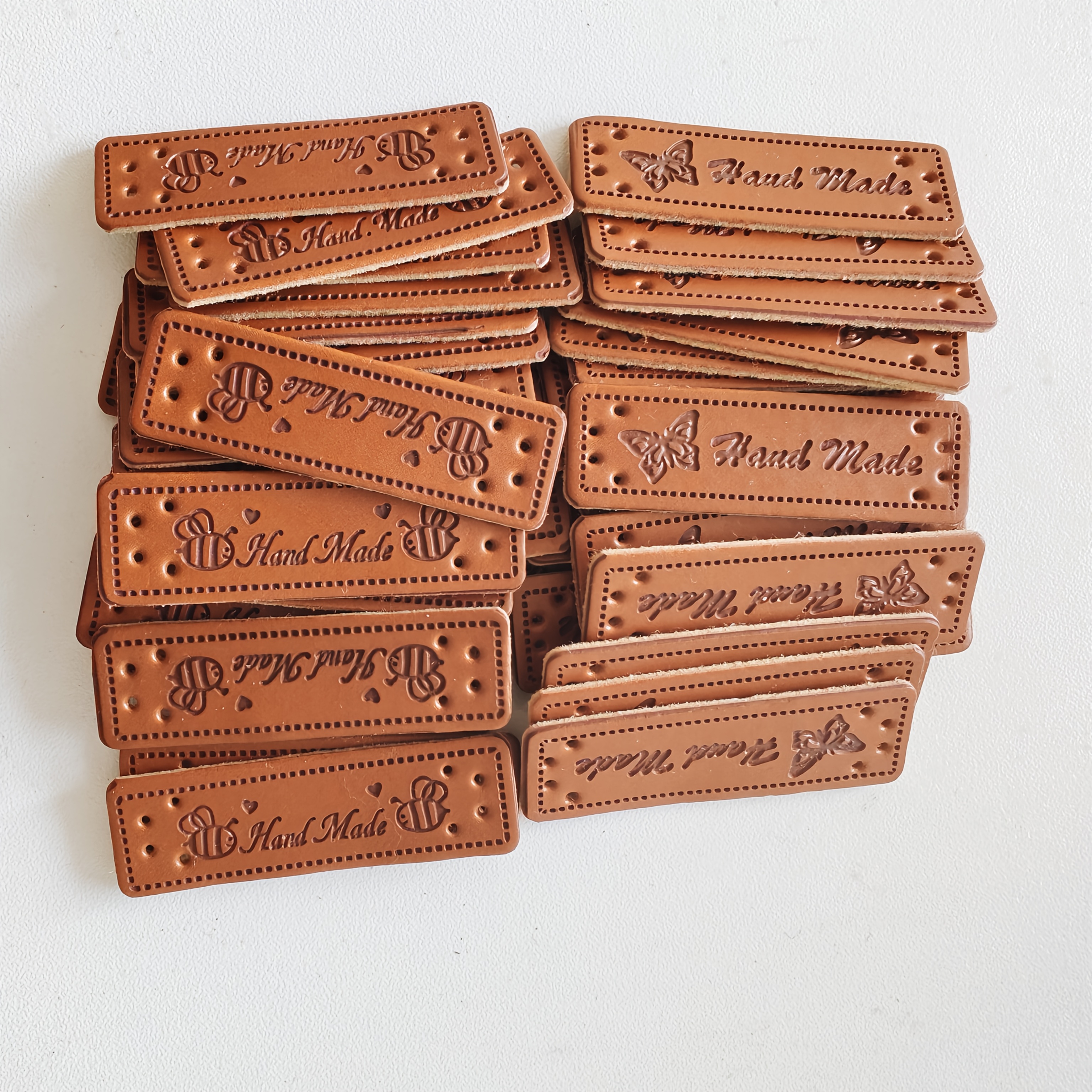 Image of 40pcs Cartoon Pattern Handmade Hand Sewn Leather Label Clothing Suit Coat Cuff Pockets Socks Shoes Caps Bag Decoration Label