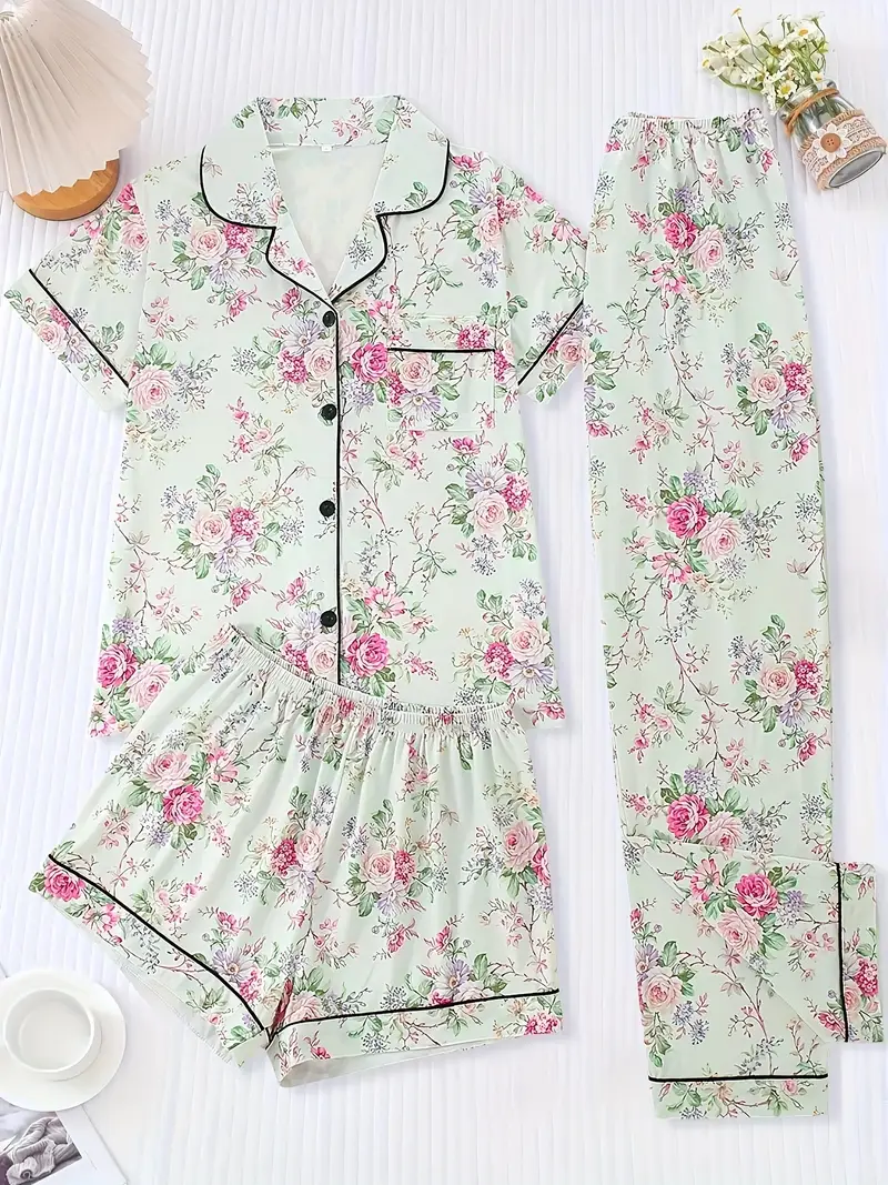 a floral pajama set featuring a short sleeve button up top elastic waist shorts and long pants suitable for year round wear casual womens sleepwear in Product details 0