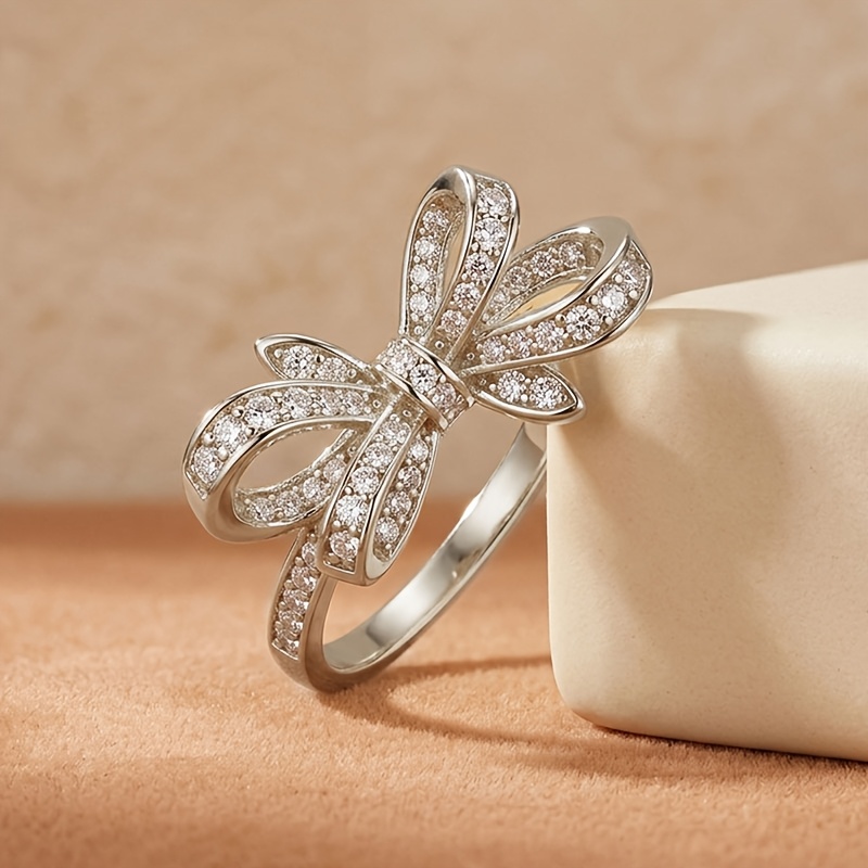 Unisex Exquisite Bow-Shaped Ring with Sparkling Synthetic Zircon