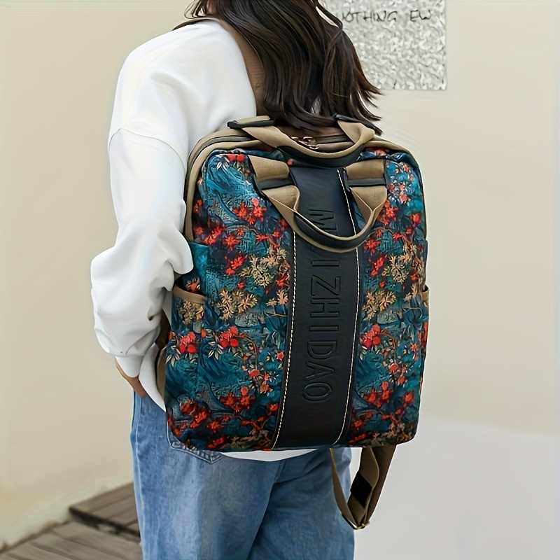Mochila antirrobo para mujer, mochila de gran capacidad con estampado de moda, mochila ligera de nailon para portátil para viajes informales, desplazamientos y uso al aire libre, patrón aleatorio