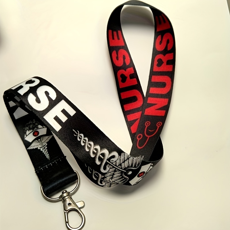 

Nurse Themed Nylon Lanyard With Keychain Clip - Durable And Stylish Wrist Strap For Id Badge, Phone, And Keys - 45cm Length - Black And Red Design With Medical Symbol Print