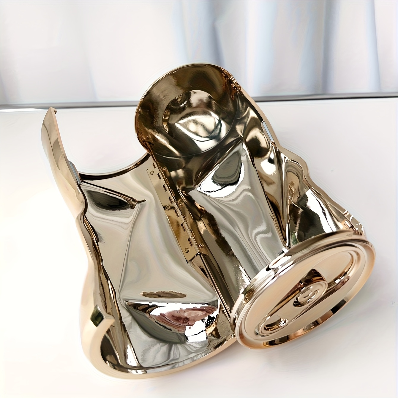 Electroplated glossy metallic chain evening bag, a stylish accessory for banquets and parties