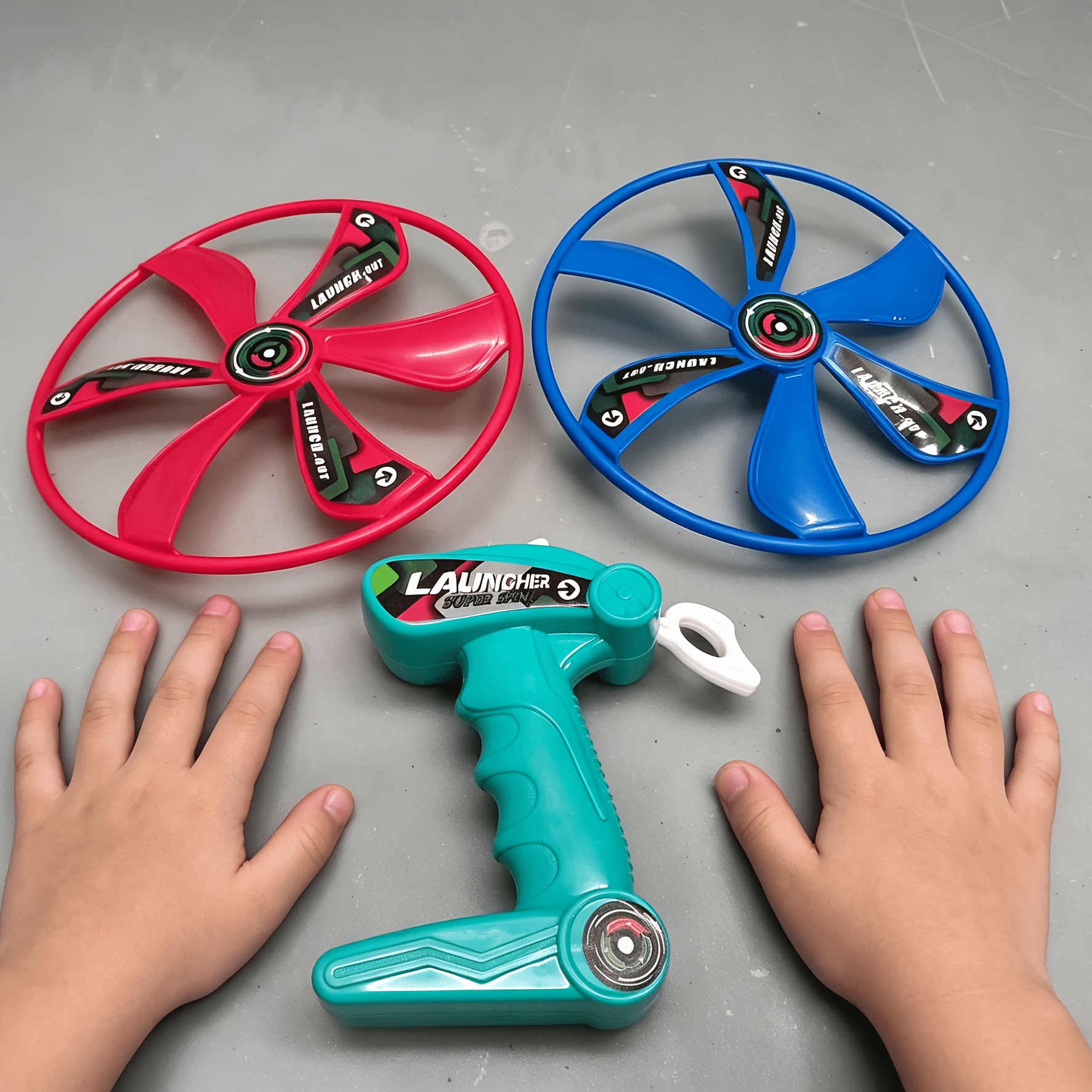 3pcs spinning flying saucer toy set a flight toy with one launcher and two saucers parent child interaction and outdoor play random color Product details 3