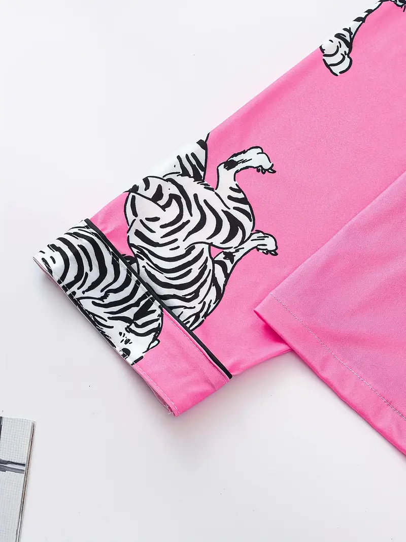 two piece elegant womens sleepwear set comfortable fabric long sleeved button up top with matching pants printed all over pocket details suitable for wear Product details 3