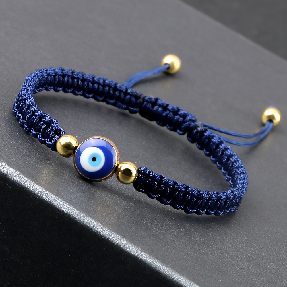Image of A Blue Evil Eye Bracelet Made Of Nylon Thread And Copper Alloy, Suitable For Men And Women, Featuring A Easy And Everyday Jewelry Design