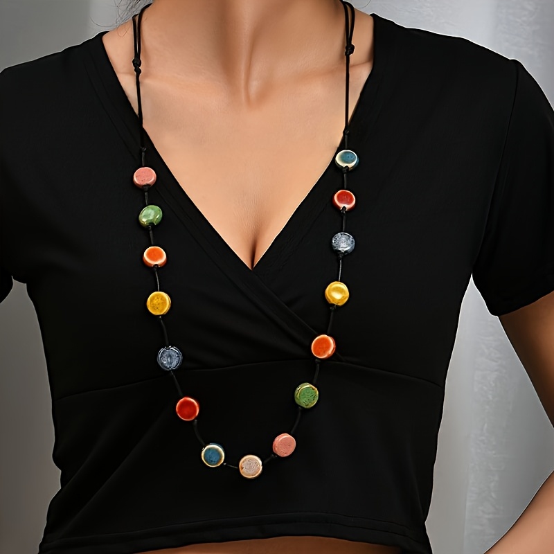 Image of 1pc Bohemian Multicolor Beaded Braided Rope Ceramic Necklace, Vintage Ethnic Style Unique Sweater Chain, Simple Long Neck Accessory For Women, Fashionable Wearable Item, Holiday Gift (ceramic Random)