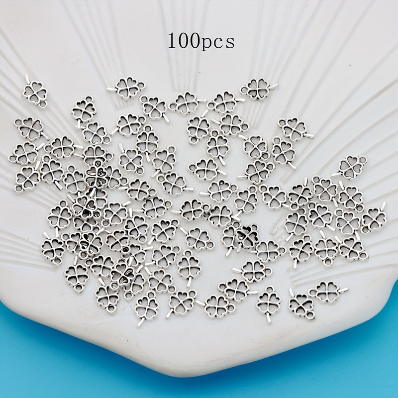 Image of 100pcs Hollow Clover Earrings Charm Pendant Charms Antique Silvery Plated Small Business Supplies Alloy Plated Hollow Pendant Charms Making Necklace/earrings Pendant For