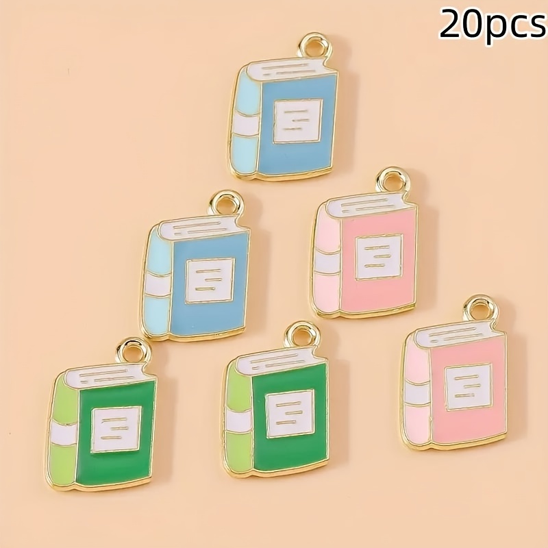Image of 20pcs Cartoon Book Pendant Set, Alloy Jewelry Making Accessories, Suitable For Earrings, Necklaces, And Keychains