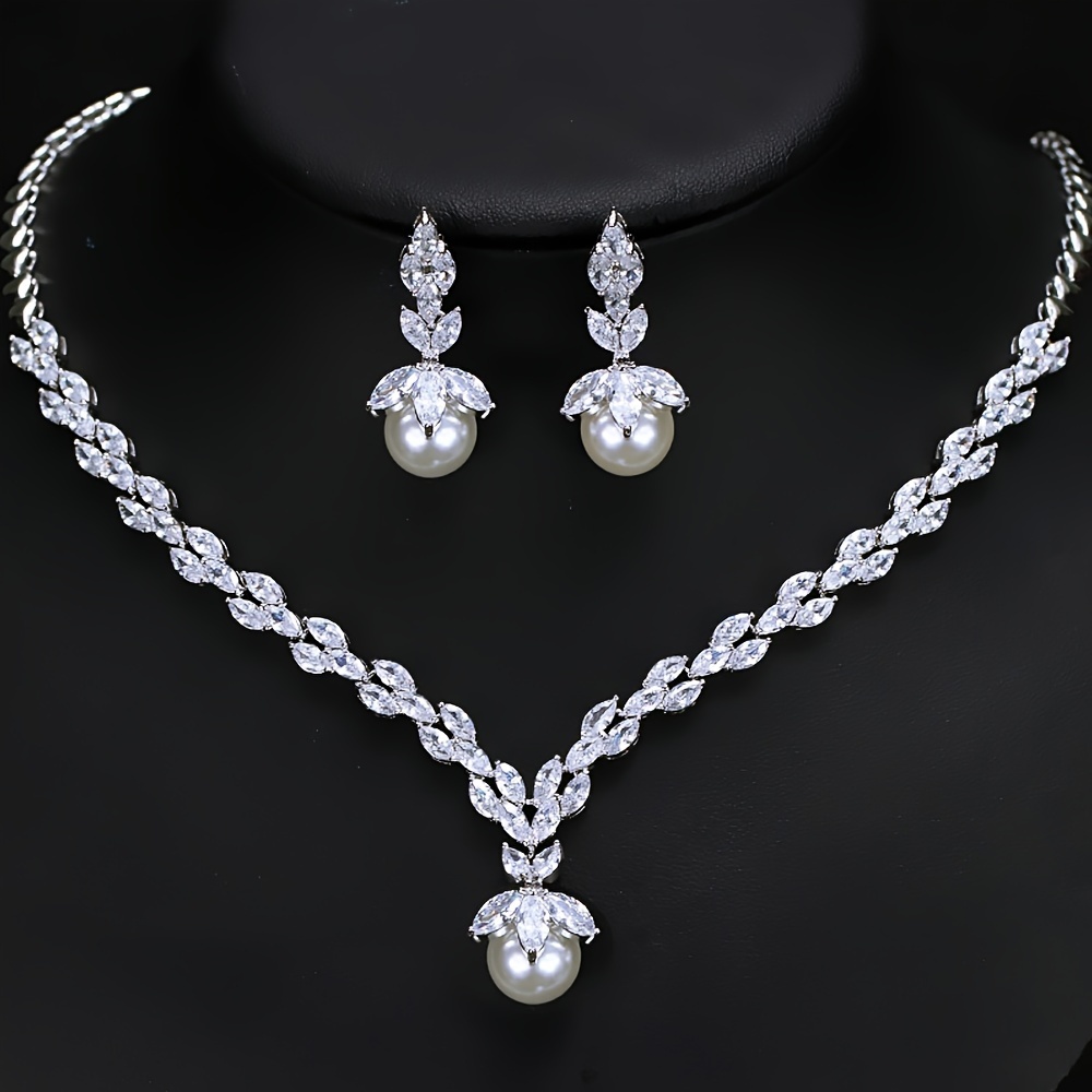 Image of A Set Of 3 Elegant Bridal Additions Featuring Cubic Zirconia And Round White Pearl Pendant Necklace And Earrings, Perfect For Women's Wedding Jewelry