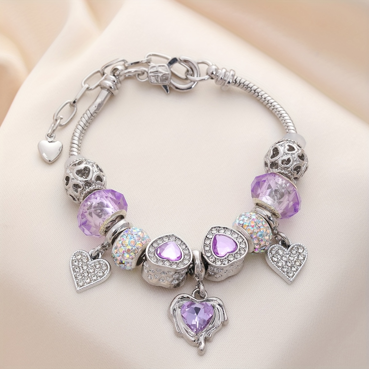 purple bracelet sold on Temu United States Elegant Silver and Purple Charm Bracelet main image 0