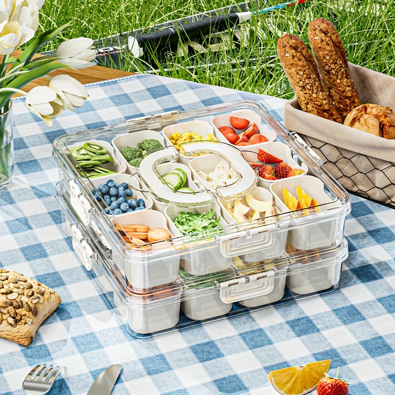 

A Portable Snack Tray With A Lid And Handle, Featuring 12 Separate Compartments, Ideal For Parties, Travel, And Picnics.