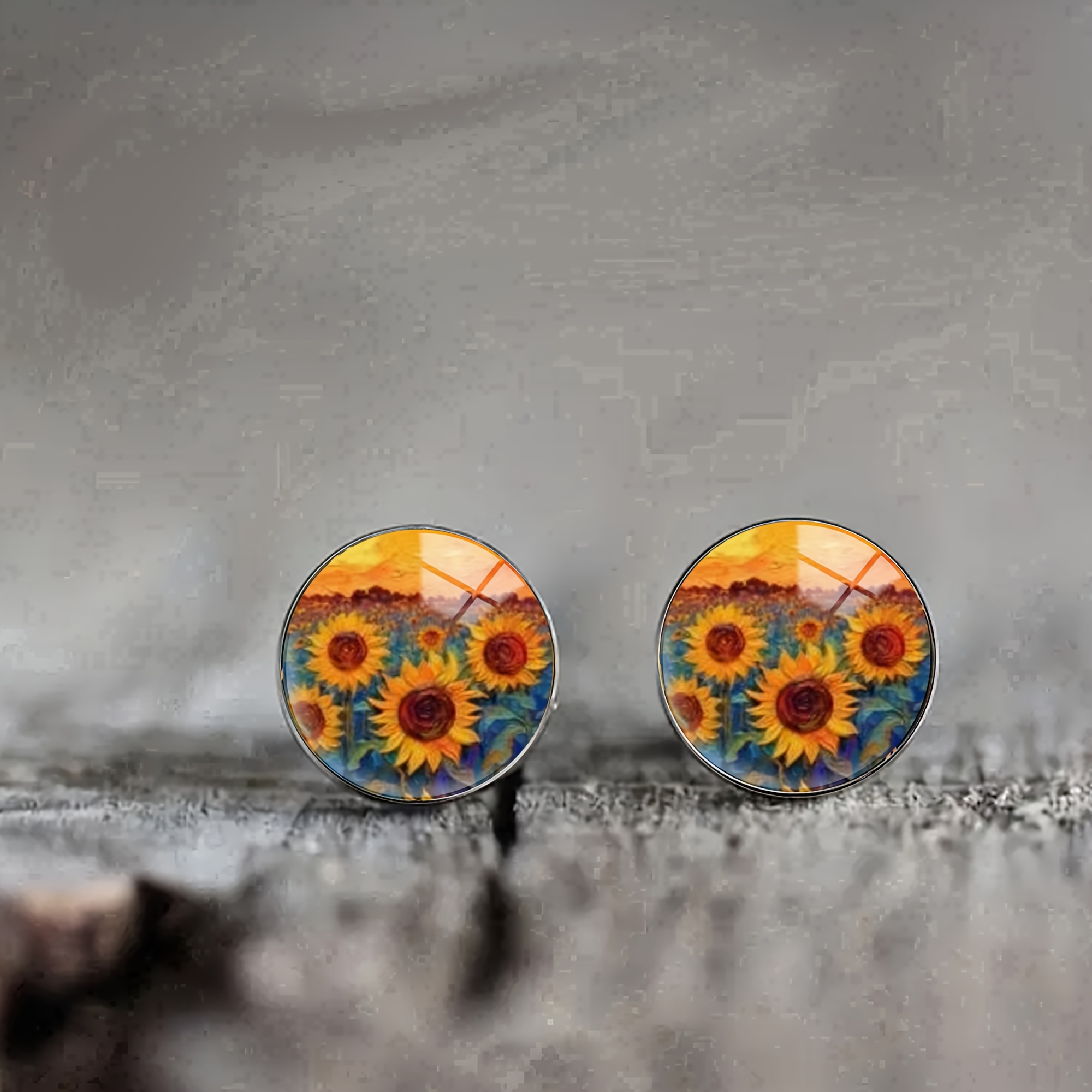 

A Pair Of Stainless Steel Earrings With Sunflower Sea In The Sunset, Elegant And Unique For Wearing On Vacation.