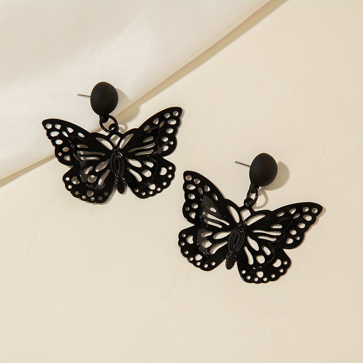 High-End Dark Retro Iron Hollow Butterfly Earrings