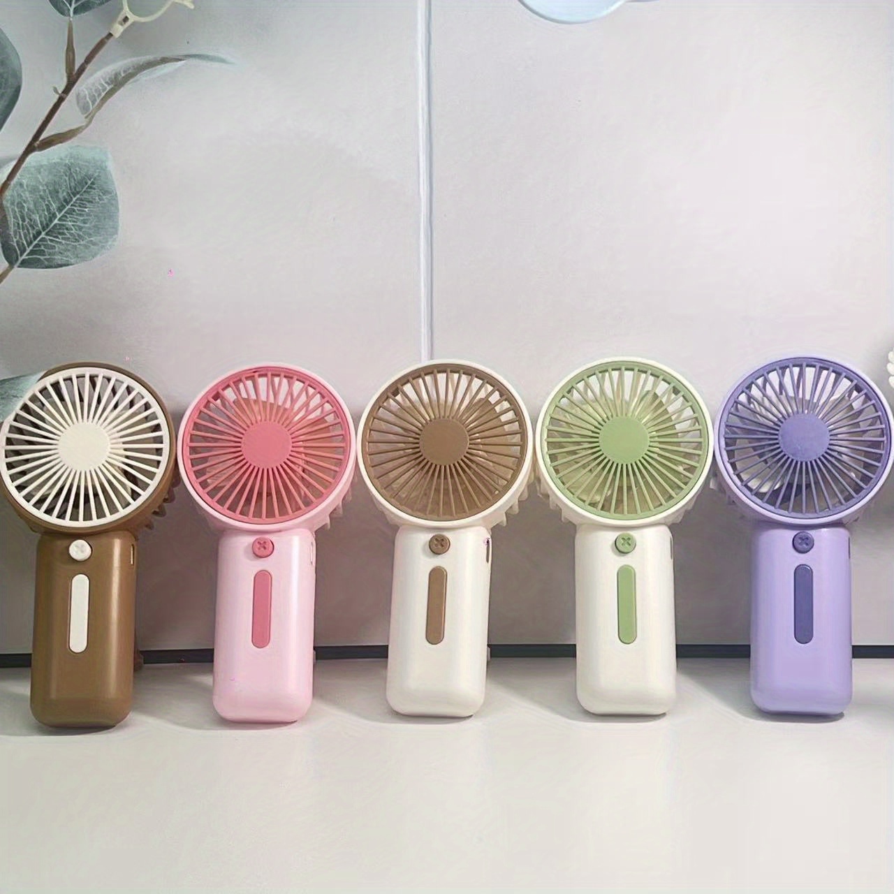 Mini Ventilador Portátil de Mano Disponible en 4 Colores - Portátil y Compacto (Sin Costo) - Adecuado para Múltiples Escenarios