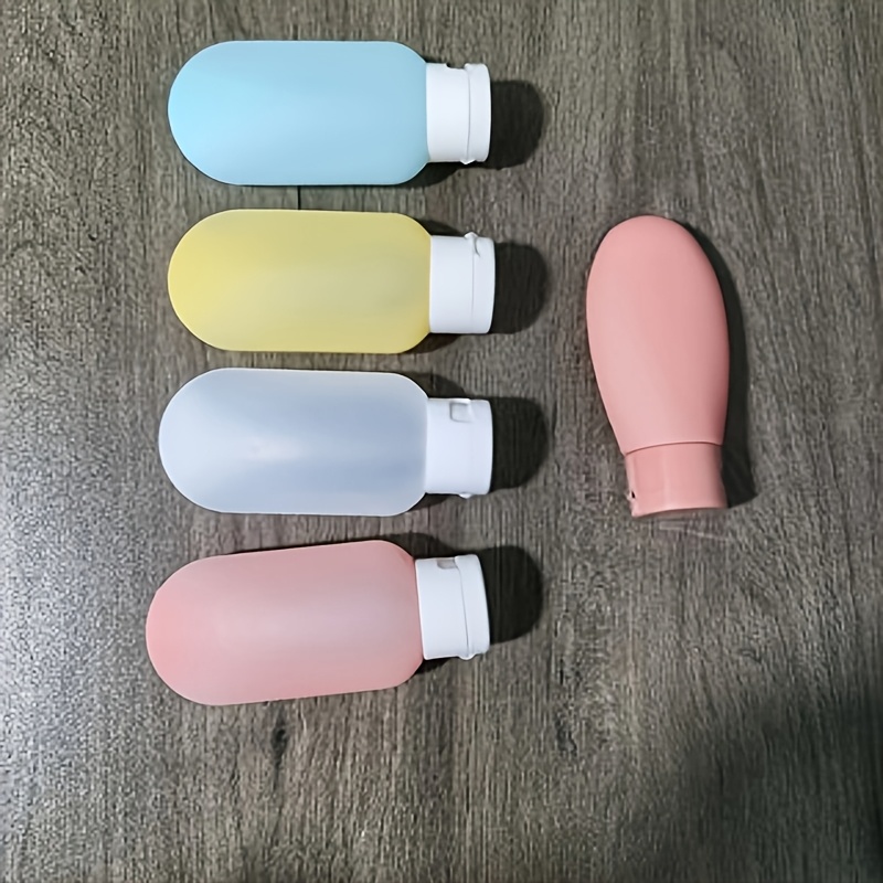 TEMU Set da 5 da viaggio ricaricabili in plastica, capacit� 2.03oz, design a di perdite, adatti per lozione, shampoo e bagnoschiuma��Organizzatore di