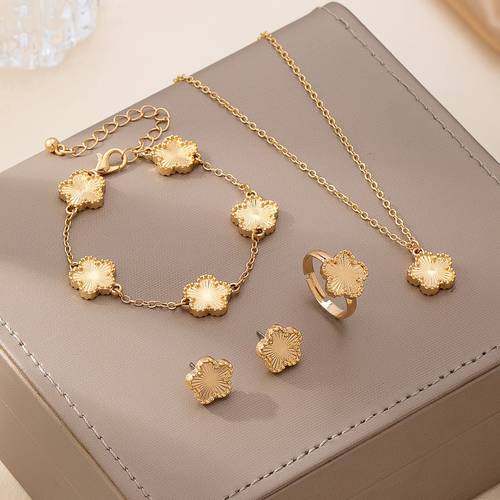 a set of four elegant and minimalist luxurious clover flower additions suitable for women to or at parties