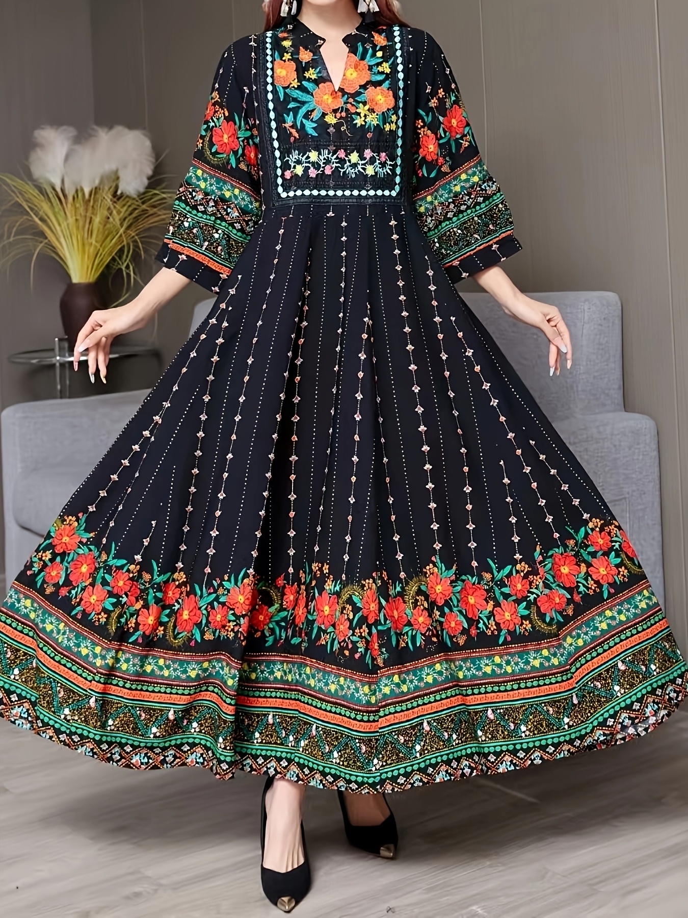 Vibrant floral embroidered maxi dress in flowing polyester perfect for summer vacations and casual outings