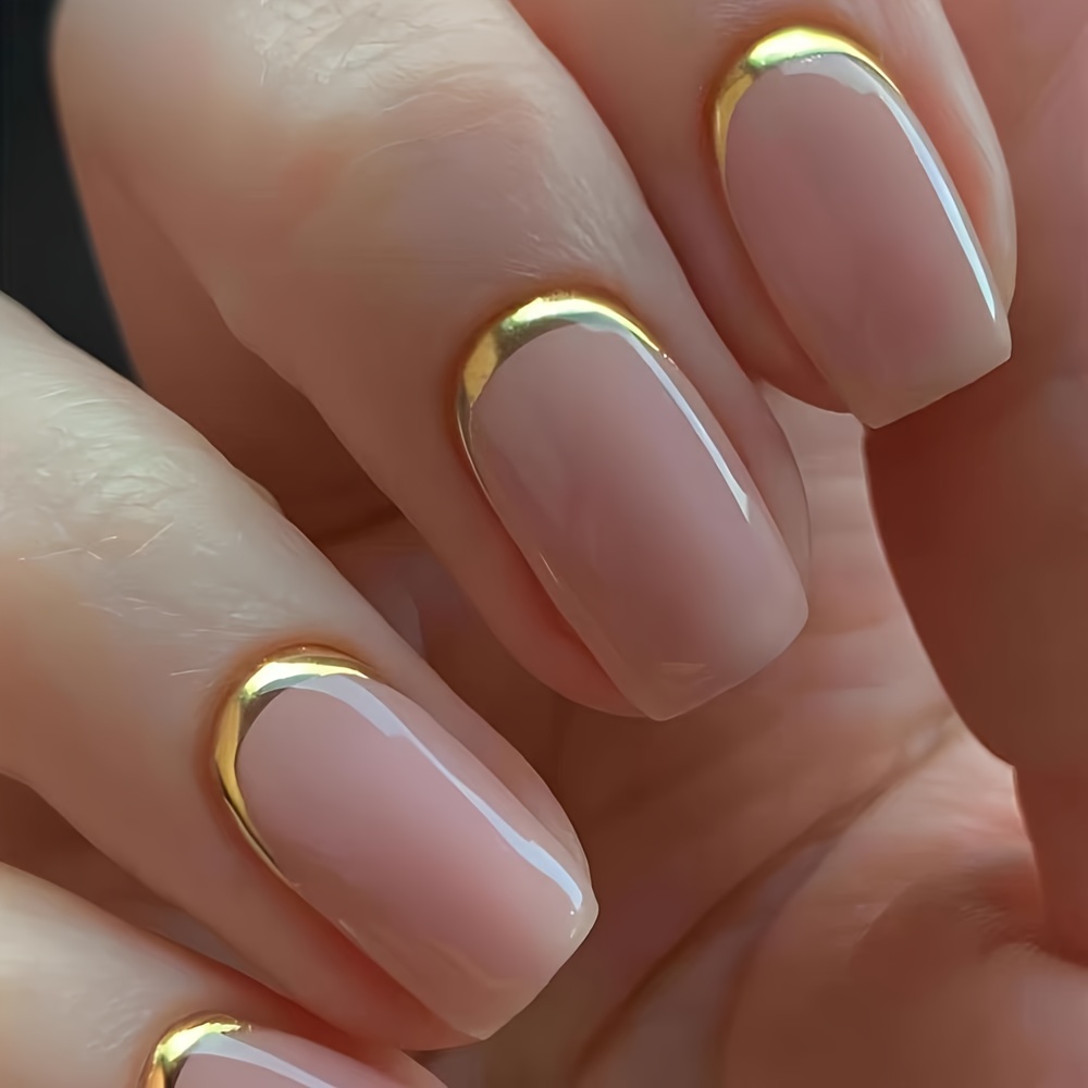 

Lot de 24 faux ongles à coller, carrée française, accent doré, simple et , une lime à ongles, de la colle gelée, un bâton , pour un des femmes, couleurs dorées et transparentes