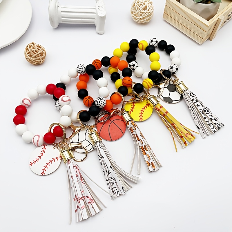 

Sporty Chic Silicone Beaded Wrist Keychain With Tassel - Featuring Baseball, Basketball, Volleyball, Soccer Charms & More - Ideal Gift For Sports Enthusiasts And