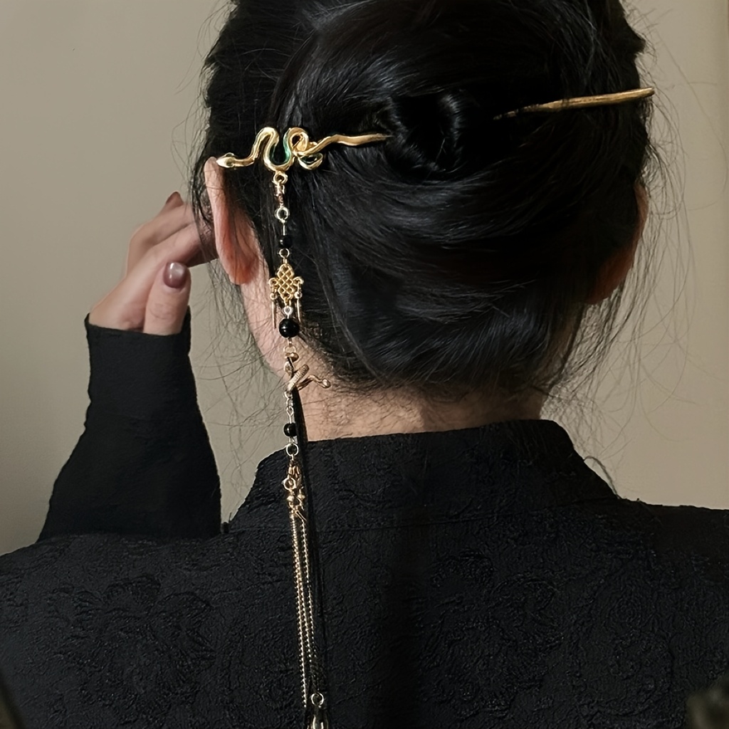 E-shop Eine elegante und stilvolle Haarnadel im neuen chinesischen Design mit einem fließenden Schlangenband und Quasten, ein vintage Haar-Accessoire
