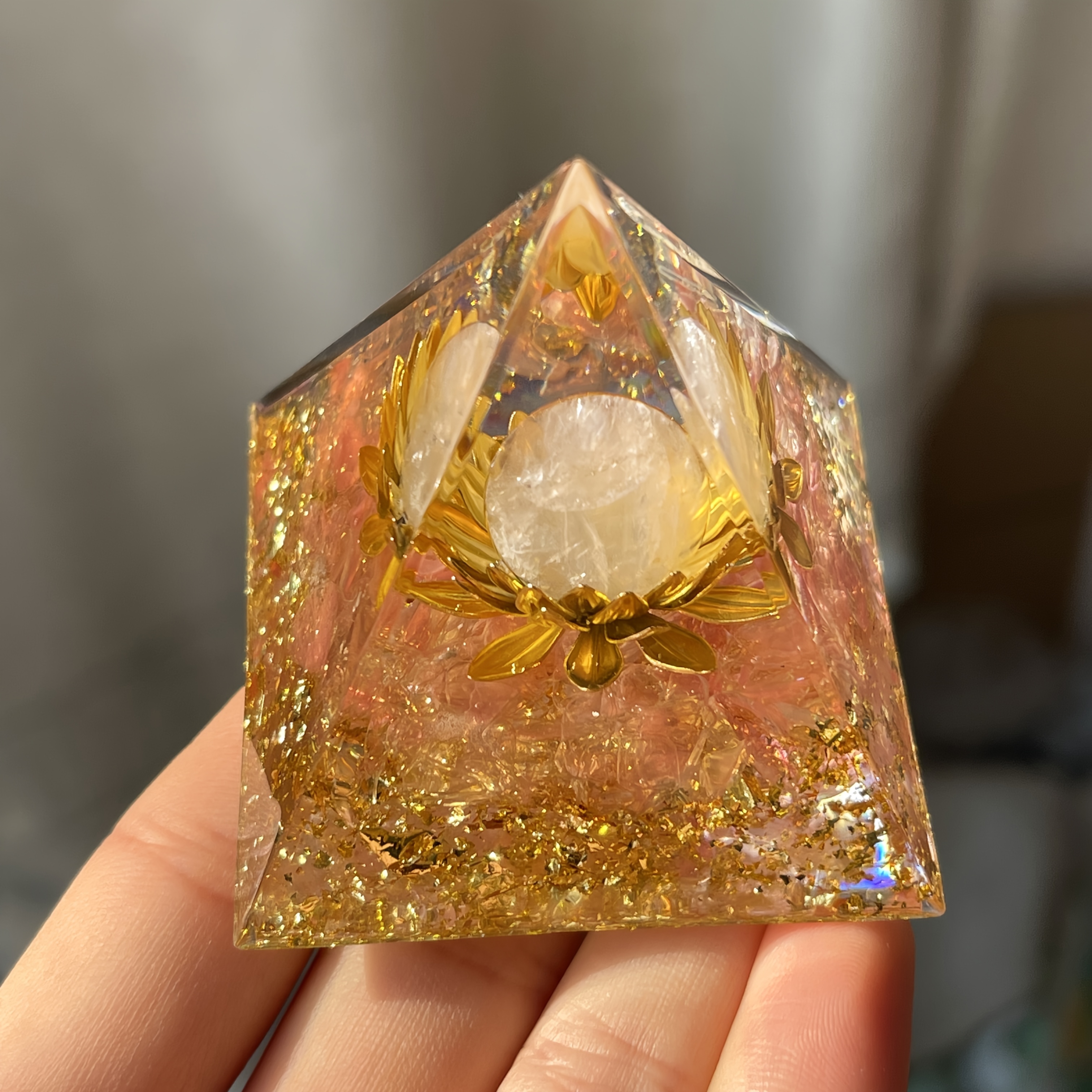 Image of Rose Quartz Sphere Pyramid: Rose Quartz Kneads Moonlight Into A Sphere, Letting It Rest By For Lotus. Each Refracted Is A Love Letter From The Universe, Tucking And Corners Of Life.